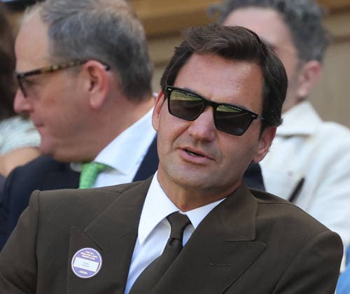 Roger Federer watches tennis from the Royal box at Wimbledon on day eight of the 2026 Wimbledon Championships in London on Monday, July 06, 2026.  LON2026070620 HUGOxPHILPOTT