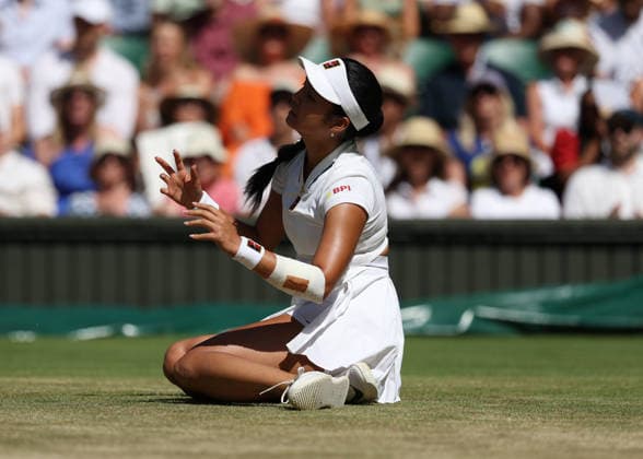 6th July 2026; All England Lawn Tennis and Croquet Club, London, England; Wimbledon Tennis Tournament, Day Eight; Alexandra Eala (PHL) slips on the court in her match against Jasmine Paolini (ITA) JohnxPatrickxFletcher
