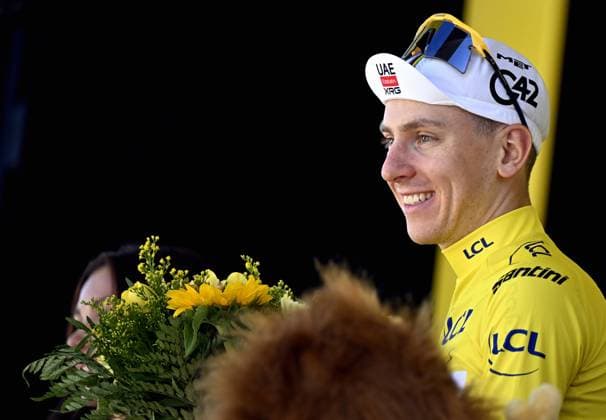 Slovenian Tadej Pogacar of UAE Team Emirates XRG celebrates on the podium in the yellow jersey of leader in the overall ranking after stage 3 of the 2026 Tour de France cycling race, a stage of 195,9km from Granollers, Spain, to Les Angles, France, Monday 06 July 2026. The 113th edition of the Tour de France starts on Saturday 4 July in Barcelona, Spain, and will finish in Paris, France on the 26th of July. JASPERxJACOBS  x180516929x