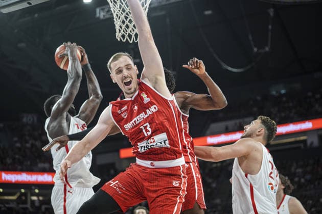 Turkiye v Switzerland - FIBA Basketball World Cup 2027 European Qualifiers ISTANBUL, TURKIYE - JULY 6: Adem Bona (L) of Turkiye in action against Killian Martin (13) of Switzerland during the first round of the 2027 World Cup European Qualifiers Group C basketball match between Turkiye and Switzerland at Sinan Erdem Sports Hall in Istanbul, Turkiye, on July 6, 2026. Beyza Comert Anadolu Istanbul Turkey. Editorial use only. Please get in touch for any other usage.  Copyright: x2026xAnadoluxBeyzaxComertx