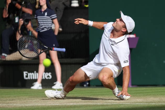 Great Britain s Arthur Fery winces in pain during his match against Bulgarian Grigor Dimitrov at Wimbledon on day eight of the 2026 Wimbledon Championships in London on Monday, July 06, 2026.  LON2026070674 HUGOxPHILPOTT