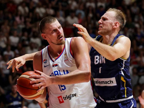 Serbia v Bosnia - FIBA World Cup 2027 Qualifiers Nikola Jokic (L) of Serbia in action against Adin Vrabac (R) of Bosnia and Herzegovina during the FIBA World Cup 2027 Qualifiers match between Serbia and Bosnia and Herzegovina at Aleksandar Nikolic Hall on July 06, 2026 in Belgrade, Serbia. Belgrade Serbia Copyright: xSrdjanxStevanovicx x