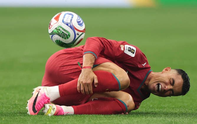 (260707) -- DALLAS, July 7, 2026 -- Cristiano Ronaldo of Portugal falls down during the round of 16 match between Spain and Portugal at the 2026 FIFA World Cup, WM, Weltmeisterschaft, Fussball at Dallas Stadium in Dallas, the United States, July 6, 2026. ) (SP)U.S.-DALLAS-FOOTBALL-FIFA WORLD CUP-ROUND OF 16-ESP VS POR LixYing 