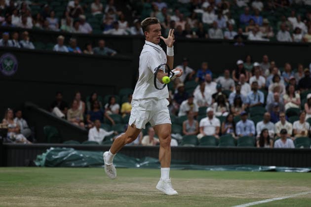 6th July 2026; All England Lawn Tennis and Croquet Club, London, England; Wimbledon Tennis Tournament, Day Eight; Jiri Lehecka (CZE) with a forehand shot to Alexander Zverev (GER) JohnxPatrickxFletcher