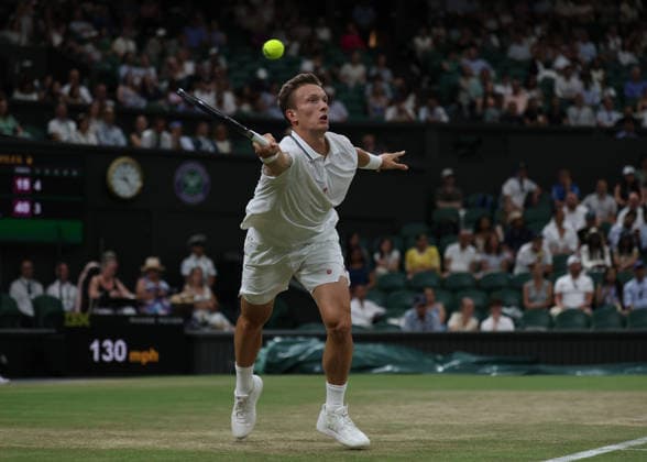 6th July 2026; All England Lawn Tennis and Croquet Club, London, England; Wimbledon Tennis Tournament, Day Eight; Jiri Lehecka (CZE) with a forehand shot to Alexander Zverev (GER) JohnxPatrickxFletcher