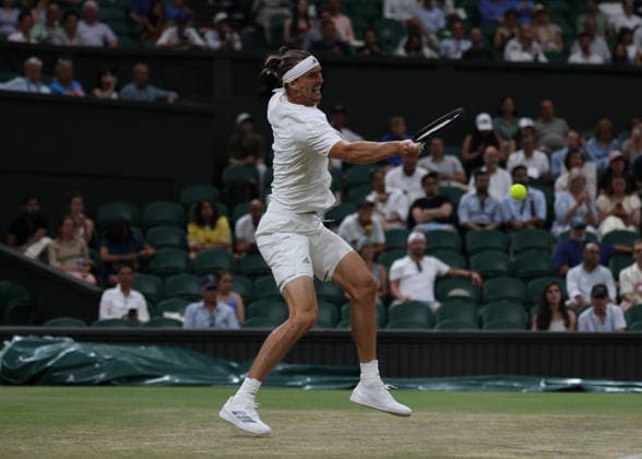 6th July 2026; All England Lawn Tennis and Croquet Club, London, England; Wimbledon Tennis Tournament, Day Eight; Alexander Zverev (GER) with a forehand shot to Jiri Lehecka (CZE) JohnxPatrickxFletcher