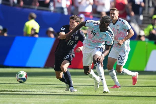 USA v Belgium - FIFA World Cup, WM, Weltmeisterschaft, Fussball 2026 - Round of 16 SEATTLE, USA - JULY 6: Pulisic of Usa in action against Amadou Onana of Belgium during the 2026 FIFA World Cup Round of 16 match between USA and Belgium at Lumen Field (Seattle Stadium) in Seattle, Washington, United States on July 6, 2026. Ercin Erturk Anadolu Washington United States. Editorial use only. Please get in touch for any other usage.  Copyright: x2026xAnadoluxErcinxErturkx