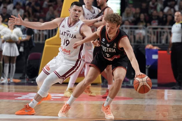 Basketball Latvia-Austria, Riga, Latvia, 06.07.2026, basket, basketball Miro Zapf of Austria and Rihards Lomazs of Latvia in action during FIBA World Cup 2027 European qualifiers group F game between Latvia™s and Austria™s national basketball teams. Riga, Latvia, 06.07.2026. Photo: Roman Koksarov (RKF) Riga Latvia Copyright: xRomanxKoksarovx baskLAT-AUT20260706rk458.JPG