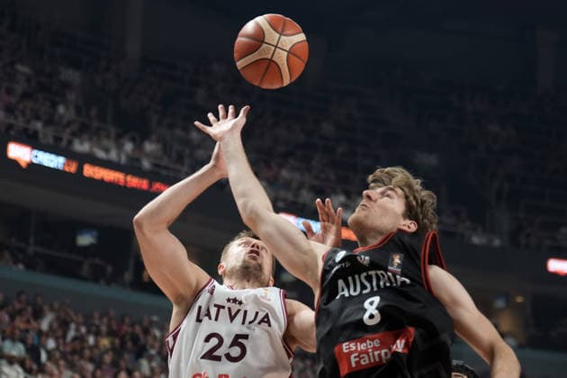 Basketball Latvia-Austria, Riga, Latvia, 06.07.2026, basket, basketball Florian Koppel of Austria and Martins Laksa of Latvia in action during FIBA World Cup 2027 European qualifiers group F game between Latvia™s and Austria™s national basketball teams. Riga, Latvia, 06.07.2026. Photo: Roman Koksarov (RKF) Riga Latvia Copyright: xRomanxKoksarovx baskLAT-AUT20260706rk710.JPG