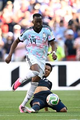 USA vs Belgium - FIFA World Cup, WM, Weltmeisterschaft, Fussball 2026 SEATTLE, UNITED STATES OF AMERICA - JULY 06 : Lukebakio Dodi forward of Belgium battles for the ball with Tillman Malik midfielder of USA pictured during the FIFA World Cup 2026 round of 16 match between the United States of America and Belgium at the Lumen Field stadium on July 6, 2026 in Seattle, United States of America, 06 07 2026 Seattle United States of America  Copyright: xNicoxVereeckenx