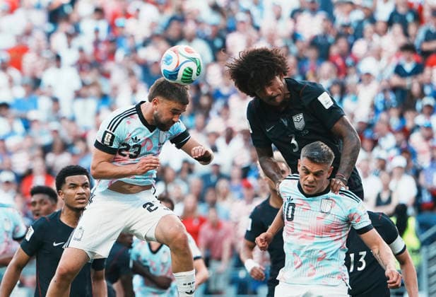 (260707) -- SEATTLE, July 7, 2026 -- Chris Richards (R, top) of the United States vies for a header with Nicolas Raskin (L, top) of Belgium during the round of 16 match between the United States and Belgium at the 2026 FIFA World Cup, WM, Weltmeisterschaft, Fussball at Seattle Stadium in Seattle, the United States, July 6, 2026. ) (SP)U.S.-SEATTLE-FOOTBALL-FIFA WORLD CUP-ROUND OF 16-USA VS BEL XuxChang 