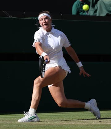 Czech Karolina Muchova plays a forehand in her Women s Quarter-Finals match against Japan s Naomi Osaka on day nine of the 2026 Wimbledon Championships in London on Tuesday, July 7, 2026.  LON2026070764 HUGOxPHILPOTT