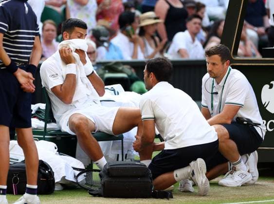 Novak Djokovic receives treatment during his quarter-final match Wimbledon Tennis Championships, Day 9, The All England Lawn Tennis and Croquet Club, London, UK - 07 Jul 2026London The All England Lawn Tennis and United Kingdom  Copyright: xKieranxMcManus Shutterstockx 16978030ct