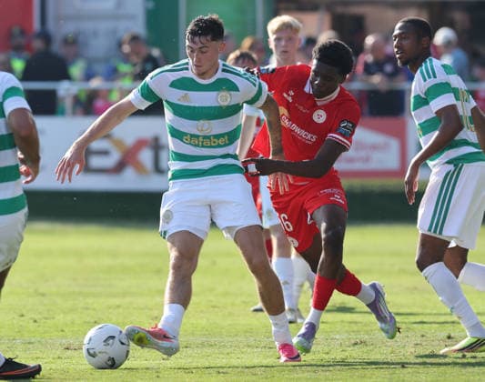 Colby Donovan of Celtic and Joey Wuna of Shelbourne Shelbourne FC v Celtic , Preseason Friendly, Football, Tolka Park, Dublin, Ireland - 07 Jul 2026Dublin Tolka Park Ireland  Copyright: xLorrainexO Sullivan Shutterstockx 16980106r