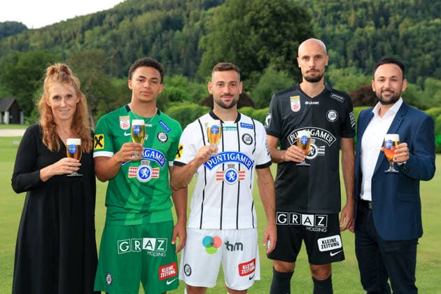 SOCCER - BL, Sturm, jersey presentation FROHNLEITEN,AUSTRIA,07.JUL.26 - SOCCER - ADMIRAL Bundesliga, SK Sturm Graz, jersey presentation. Image shows Jacob Peter Hoedl, Juergen Heil and Jon Gorenc-Stankovic (Sturm) with sponsoring partners.  GEPAxpictures xMarioxBuehner-Weinrauch