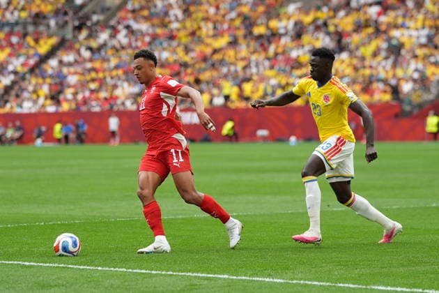 Switzerland v Colombia - FIFA World Cup, WM, Weltmeisterschaft, Fussball 2026 - Round of 16 VANCOUVER, CANADA - JULY 07: Dan Ndoye (11) of Switzerland in action against Davinson Sanchez (23) of Colombia during the 2026 FIFA World Cup Round of 16 match between Switzerland and Colombia at BC Place in Vancouver, British Columbia, Canada, on July 07, 2026 Ercin Erturk Anadolu British Columbia Canada. Editorial use only. Please get in touch for any other usage.  Copyright: x2026xAnadoluxErcinxErturkx