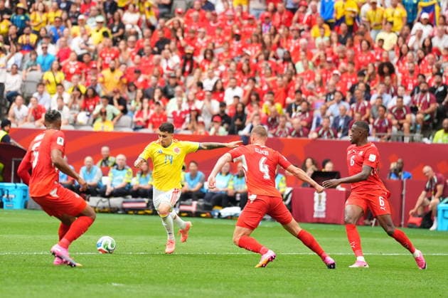 Switzerland v Colombia - FIFA World Cup, WM, Weltmeisterschaft, Fussball 2026 - Round of 16 VANCOUVER, CANADA - JULY 07: Gustavo Puerta (14) of Colombia in action against Nico Elvedi (4) of Switzerland during the 2026 FIFA World Cup Round of 16 match between Switzerland and Colombia at BC Place in Vancouver, British Columbia, Canada, on July 07, 2026 Ercin Erturk Anadolu British Columbia Canada. Editorial use only. Please get in touch for any other usage.  Copyright: x2026xAnadoluxErcinxErturkx