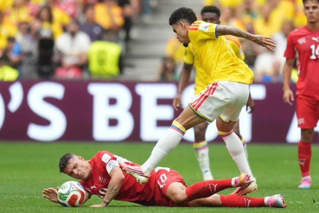 FIFA World Cup, WM, Weltmeisterschaft, Fussball 2026 - Round of 16 - Switzerland vs Colombia Luis Diaz of Colombia (R) in action against Granit Xhaka of Switzerland (L) during the FIFA World Cup 2026 Round of 16 match Switzerland against Colombia, in Vancouver, Canada, 07 July 2026. VANCOUVER Canada  Copyright: xBOBxFRIDx