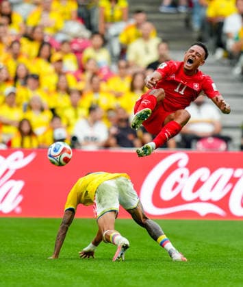 Switzerland v Colombia - FIFA World Cup, WM, Weltmeisterschaft, Fussball 2026 - Round of 16 VANCOUVER, CANADA - JULY 07: Daniel Munoz (L) of Colombia in action against Dan Ndoye (11) of Switzerland during the 2026 FIFA World Cup Round of 16 match between Switzerland and Colombia at BC Place in Vancouver, British Columbia, Canada, on July 07, 2026 Ercin Erturk Anadolu British Columbia Canada. Editorial use only. Please get in touch for any other usage.  Copyright: x2026xAnadoluxErcinxErturkx