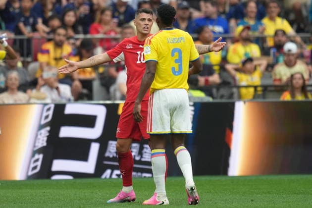 FIFA World Cup, WM, Weltmeisterschaft, Fussball 2026 - Round of 16 - Switzerland vs Colombia Granit Xhaka of Switzerland (L) in action against Jhon Lucumi of Colombia (R) during the FIFA World Cup 2026 Round of 16 match Switzerland against Colombia, in Vancouver, Canada, 07 July 2026. VANCOUVER Canada  Copyright: xBOBxFRIDx