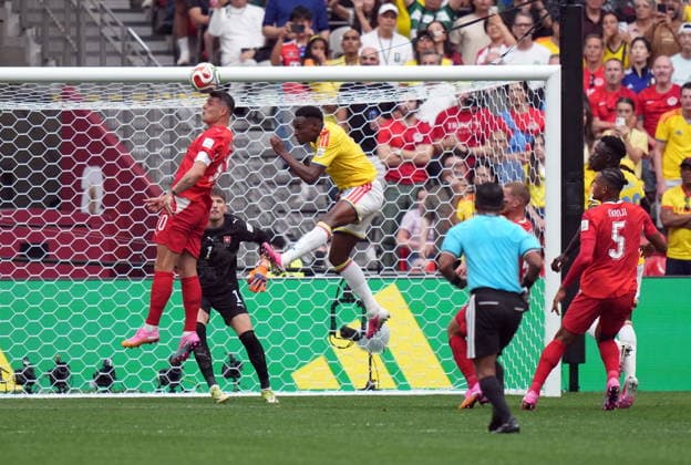 July 7, 2026, Vancouver, Bc, CANADA: Switzerland s Granit Xhaka (10) defends against Colombia s Jhon Lucumi (3) during the first half of a World Cup Round of 16 soccer match, in Vancouver, on Tuesday, July 7, 2026. Canada News - July 7, 2026  - ZUMAc35_ 20260707_zaf_c35_183 Copyright: xDarrylxDyckx