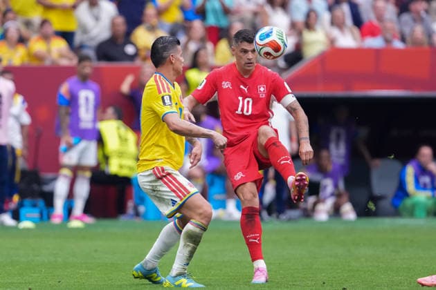 Granit Xhaka of Switzerland (R) controls the ball under pressure from James Rodriguez of Colombia (L) during a FIFA Men’s World Cup 2026 round of 16 football match between Switzerland and Colombia at BC Place Vancouver, in Vancouver on July 07th 2026 (Photo by Alexandra Fechete SPP)  Copyright: xAlexandraxFechete SPPx Sportspressphoto_SPR187124