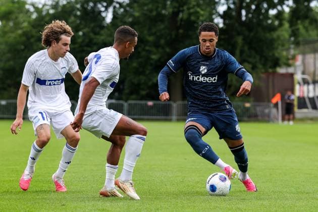 HAAKSBERGEN , 07-07-2026 , Ontmoetingspark De Greune , season 2026 2027 , Dutch pre-season football , friendly match between FC Utrecht and Apollon FC , picture shows Apollon FC player Aggelos Andreou and Apollon FC player Bruno Gaspar challenge FC Utrecht player Adrian Blake Utrecht - Apollon  x204917464x Copyright: