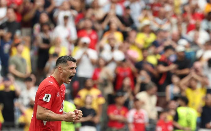 (260708) -- VANCOUVER, July 8, 2026 -- Granit Xhaka of Switzerland celebrates scoring during the penalty shootout of the round of 16 match between Switzerland and Colombia at the 2026 FIFA World Cup, WM, Weltmeisterschaft, Fussball at BC Place Vancouver in Vancouver, Canada, on July 7, 2026. (Photo by Xinhua) (SP)CANADA-VANCOUVER-FOOTBALL-FIFA WORLD CUP-ROUND OF 16-SUI VS COL ZouxZheng 