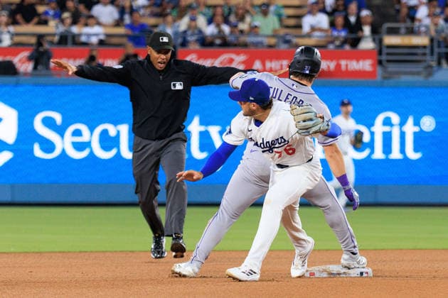 July 7, 2026, Los Angeles, California, USA: Alex Freeland 76 of the Los Angeles Dodgers is unable to make an out on Braxton Fulford 37 of the Colorado Rockies during a regular season MLB, Baseball Herren, USA game on Tuesday July 7, 2026 at Dodger Stadium in Los Angeles, California. JAVIER ROJAS PI Dodgers Lose To Rockies, 3-4  - ZUMAp124 20260707_zaa_p124_035 Copyright: xJavierxRojasx