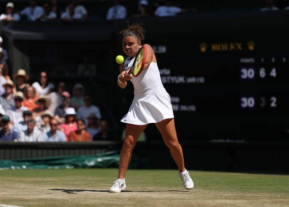 RECORD DATE NOT STATED 8th July 2026; All England Lawn Tennis and Croquet Club, London, England; Wimbledon Tennis Tournament, Day Ten; Jasmine Paolini (ITA) with a backhand shot to Marta Kostyuk (UKR) JohnxPatrickxFletcher