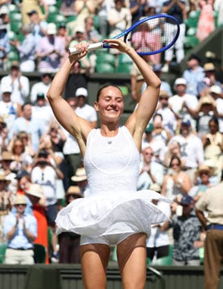 Ukraine s Marta Kostyuk spins in victory in her Women s Quarter-Finals match against Italy s Jasmine Paolini on day Ten of the 2026 Wimbledon Championships in London on Wednesday, July 08,2026. Kostyuk won the match 6-3 6-2.  LON2026070834 HUGOxPHILPOTT