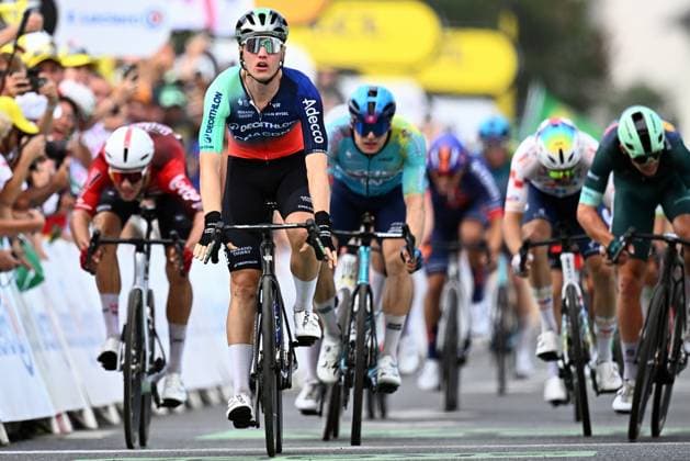 Dutch Olav Kooij of Decathlon CMA CGM Team celebrates as he crosses the finish line to win stage 5 of the 2026 Tour de France cycling race, a stage of 158km from Lannemezan to Pau, on Wednesday 08 July 2026. The 113th edition of the Tour de France starts on Saturday 4 July in Barcelona, Spain, and will finish in Paris, France on the 26th of July. JASPERxJACOBS  x180728353x