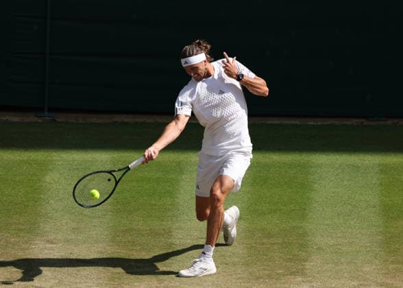 RECORD DATE NOT STATED 8th July 2026; All England Lawn Tennis and Croquet Club, London, England; Wimbledon Tennis Tournament, Day Ten; Alexander Zverev (GER) with a forehand shot to Taylor Fritz (USA) JohnxPatrickxFletcher