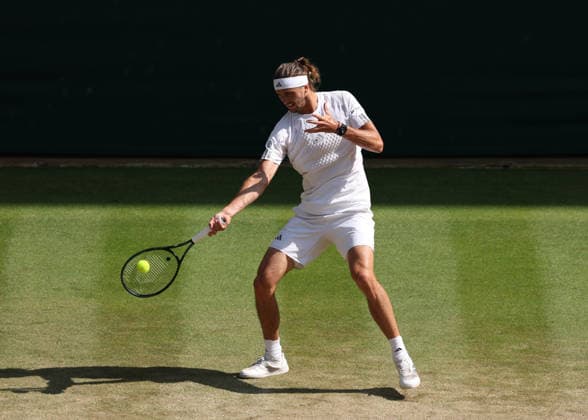 RECORD DATE NOT STATED 8th July 2026; All England Lawn Tennis and Croquet Club, London, England; Wimbledon Tennis Tournament, Day Ten; Alexander Zverev (GER) with a forehand shot to Taylor Fritz (USA) JohnxPatrickxFletcher