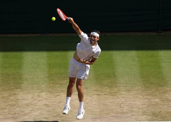 RECORD DATE NOT STATED 8th July 2026; All England Lawn Tennis and Croquet Club, London, England; Wimbledon Tennis Tournament, Day Ten; Taylor Fritz (USA) serves to Alexander Zverev (GER) JohnxPatrickxFletcher