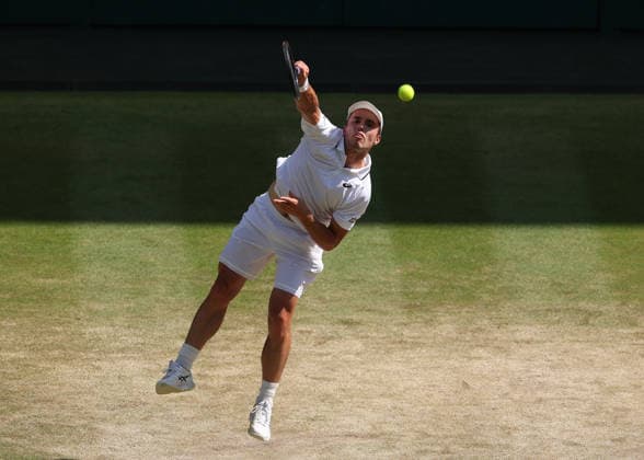 RECORD DATE NOT STATED 8th July 2026; All England Lawn Tennis and Croquet Club, London, England; Wimbledon Tennis Tournament, Day Ten; Arthur Fery (GBR) serves to Flavio Cobolli (ITA) JohnxPatrickxFletcher