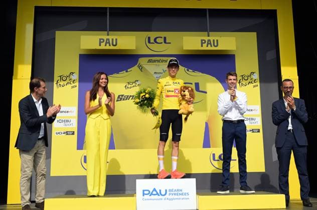 Norwegian Torstein Traeen of Uno-X Mobility celebrates on the podium in the yellow jersey of leader in the overall ranking after stage 5 of the 2026 Tour de France cycling race, a stage of 158km from Lannemezan to Pau, on Wednesday 08 July 2026. The 113th edition of the Tour de France starts on Saturday 4 July in Barcelona, Spain, and will finish in Paris, France on the 26th of July. DAVIDxPINTENS  x180729471x