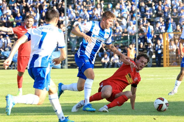 DEU, DFL, Testspiel, Hertha BSC vs. Lichtenberg 47 08.07.2026, Berliner Olympiastadion, Berlin, DEU, DFL, Testspiel, Hertha BSC vs. Lichtenberg 47 Lionel Salla (Lichtenberg47 22), Marten Winkler (Hertha BSC Berlin 22) DFL - regulations prohibit any use of Photographs as image sequences and or quasi-video *** DEU, DFL, Friendly Match, Hertha BSC vs. Lichtenberg 47, August 7, 2026, Berlin Olympic Stadium, Berlin, DEU, DFL, Friendly Match, Hertha BSC vs. Lichtenberg 47 Lionel Salla Lichtenberg47 22, Marten Winkler Hertha BSC Berlin 22 DFL regulations prohibit any use of photographs as image sequences and or quasi-video Nordphotox xEngler nph00076