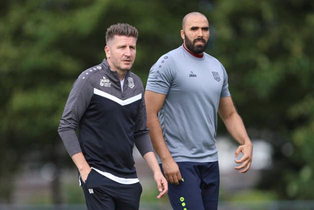 Trainer Bekim Kastrati (SC St. Tönis) und Co-Trainer Adli Lachheb (SC St. Tönis) schaut waehrend des Testspiels zwischen SC St.Tönis und Fortuna Düsseldorf, Yayla Sportpark am 08. July 2026 in Tönisvorst, Deutschland. (Foto von Oliver Kaelke DeFodi Images) +++ Trainer Bekim Kastrati (SC St. Tönis) und Co-Trainer Adli Lachheb (SC St. Tönis) looks on during the friendly match between SC St.Tönis and Fortuna Düsseldorf at Yayla Sportpark on July 8, 2026 in Tönisvorst, Germany. (Photo by Oliver Kaelke DeFodi Images) (Photo by Oliver Kaelke DeFodi Images) - *** Head Coach Bekim Kastrati of SC St. Tönis and Assistant Coach Adli Lachheb of SC St. Tönis watch during the friendly match between SC St. Tönis and Fortuna Düsseldorf at Yayla Sportpark on July 8, 2026, in Tönisvorst, Germany. Photo by Oliver Kaelke, DeFodi Images. Coach Bekim Kastrati of SC St. Tönis and assistant coach Adli Lachheb of SC St. Tönis look on during the friendly match between SC St. Tönis and Fortuna Düsseldorf at Yayla Sportpark on July 8, 2026 in Tönisvorst, Germany Photo by Oliver Kaelke DeFodi Images Photo by Oliver Kaelke DeFodi Images
