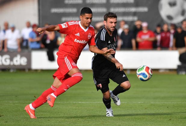 08.07.2026 - Fussball - Saison 2026 2027 - Testspiel Freundschaftsspiel Vorbereitungsspiel: TSV Kornburg - 1. FC Nürnberg Nuernberg FCN ( Club ) - Sportfoto Zink OGo - xolxgox - Ioannis Masouras (21, 1. FC Nürnberg FCN ) Fabian Klose (7, TSV Kornburg ) *** July 8, 2026 Soccer Season 2026–2027 Exhibition Match Friendly Match Preseason Match TSV Kornburg 1 FC Nuremberg Nuremberg FCN Club Sports Photo Zink OGo xolxgox Ioannis Masouras 21, 1 FC Nuremberg FCN Fabian Klose 7, TSV Kornburg