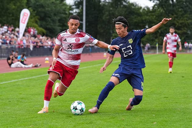 08.07.2026, xydrx, Fußball, Testspiel, SC St. Tönis - Fortuna Düsseldorf, Saison 2026 2027, YAYLA-Sportpark: Steven van der Sloot (Fortuna Düsseldorf, 2) im Zweikampf gegen Kohei Nakano (SC St. Tönis, 14) DFB regulations prohibit any use of photographs as image sequences and or quasi-video. *** July 8, 2026, xydrx, soccer, friendly match, SC St. Tönis vs. Fortuna Düsseldorf, 2026–2027 season, YAYLA Sportpark Steven van der Sloot Fortuna Düsseldorf, 2 in a tackle against Kohei Nakano of SC St. Tönis, 14 DFB regulations prohibit any use of photographs as image sequences and or quasi-video Copyright: HMBxMedia YannisxDreimann