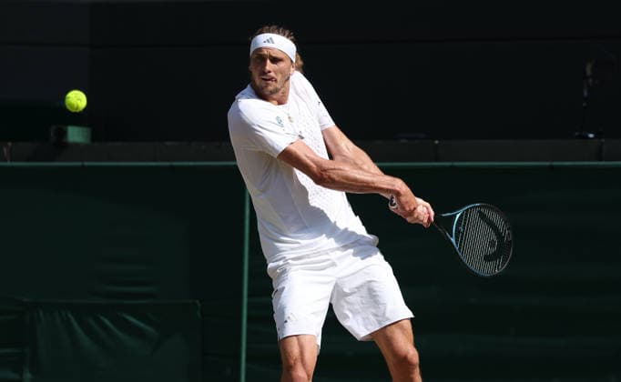 Germany s Alexander Zverev plays a backhand in his Men s Quarter-Finals match against American Taylor Fritz on day Ten of the 2026 Wimbledon Championships in London on Wednesday, July 08,2026. Zverev won the match 6-4 6-4 6-2.  LON2026070891 HUGOxPHILPOTT
