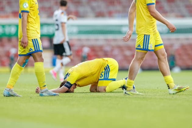 Wrexham, Wales, 8th July 2026. Kyrylo Dihtiar of Ukraine reacts at the full time result as Ukraine lose their Semi Final following the Ukraine U19 vs Germany U19 UEFA European U19 Championship match at The Racecourse, Wrexham. Picture credit should read: Cody Froggatt Sportimage EDITORIAL USE ONLY. No use with unauthorised audio, video, data, fixture lists, club league logos or live services. Online in-match use limited to 120 images, no video emulation. No use in betting, games or single club league player publications. SPI_049_CF_UKRAINE_U19_V_GERMANY_U19 SPI-4857-0048