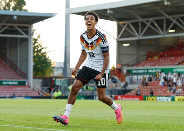 Wrexham, Wales, 8th July 2026. Francis Onyeka of Germany celebrates scoring their sides second goal during the Ukraine U19 vs Germany U19 UEFA European U19 Championship match at The Racecourse, Wrexham. Picture credit should read: Cody Froggatt Sportimage EDITORIAL USE ONLY. No use with unauthorised audio, video, data, fixture lists, club league logos or live services. Online in-match use limited to 120 images, no video emulation. No use in betting, games or single club league player publications. SPI_177_CF_UKRAINE_U19_V_GERMANY_U19 SPI-4857-0176