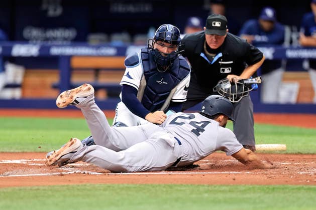 July 8, 2026, St. Petersburg, Florida, USA: New York Yankees right fielder Jasson DomoÂ­nguez (24) is tagged out at home plate by Tampa Bay Rays catcher Nick Fortes (40) during an MLB, Baseball Herren, USA game on July 8, 2026 at Tropicana Field. The Rays beat the Yankees 3-0. MLB 2026: Tampa Bay Rays 3 : 0 New York Yankees  - ZUMAh180 20260708_zsp_h180_023 Copyright: xKimxHukarix