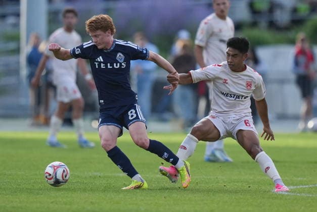 July 8, 2026, Burnaby, Bc, CANADA: Vancouver Whitecaps Oliver Larraz (8) and Cavalry FC s Michael Baldisimo (6) vie for the ball during the first half of a Canadian Championship quarterfinal soccer match, in Burnaby, B.C., on Wednesday, July 8, 2026. Canada News - July 8, 2026  - ZUMAc35_ 20260708_zaf_c35_082 Copyright: xDarrylxDyckx