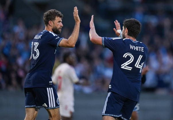 July 8, 2026, Burnaby, Bc, CANADA: Vancouver Whitecaps Thomas Muller (13) and Brian White (24) celebrate Muller s goal during the second half of a Canadian Championship quarterfinal soccer match against Cavalry FC, in Burnaby, B.C., on Wednesday, July 8, 2026. Canada News - July 8, 2026  - ZUMAc35_ 20260708_zaf_c35_088 Copyright: xDarrylxDyckx