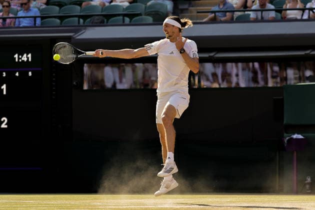 (260709) -- LONDON, July 9, 2026 -- Alexander Zverev of Germany returns the ball during the men s singles quarterfinal match against Taylor Fritz of the United States at the Wimbledon Tennis Championships in London, Britain, on July 8, 2026. (Photo by Xinhua) (SP)BRITAIN-LONDON-TENNIS-WIMBLEDON-MEN S SINGLES DinendraxHaria 