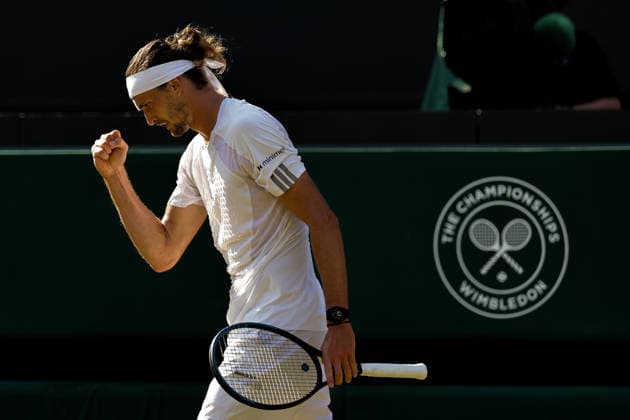 (260709) -- LONDON, July 9, 2026 -- Alexander Zverev of Germany reacts during the men s singles quarterfinal match against Taylor Fritz of the United States at the Wimbledon Tennis Championships in London, Britain, on July 8, 2026. (Photo by Xinhua) (SP)BRITAIN-LONDON-TENNIS-WIMBLEDON-MEN S SINGLES DinendraxHaria 