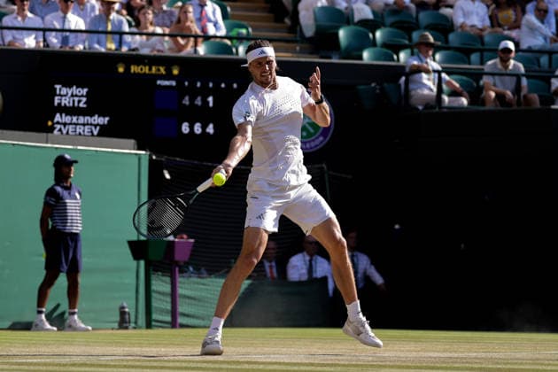 (260709) -- LONDON, July 9, 2026 -- Alexander Zverev of Germany returns the ball during the men s singles quarterfinal match against Taylor Fritz of the United States at the Wimbledon Tennis Championships in London, Britain, on July 8, 2026. (Photo by Xinhua) (SP)BRITAIN-LONDON-TENNIS-WIMBLEDON-MEN S SINGLES DinendraxHaria 
